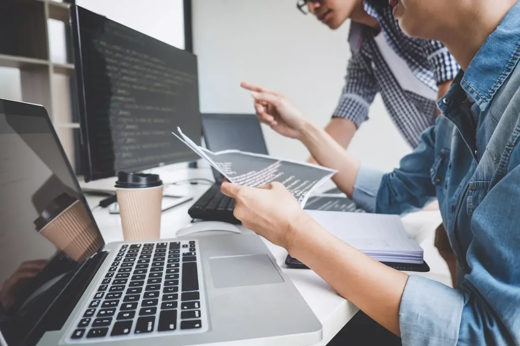 programmers cooperating at developing